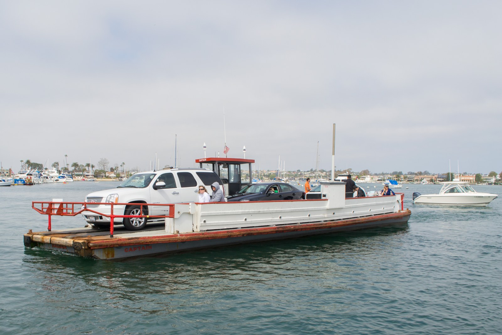 The Balboa Island Ferry carrying cars across Newport Harbor